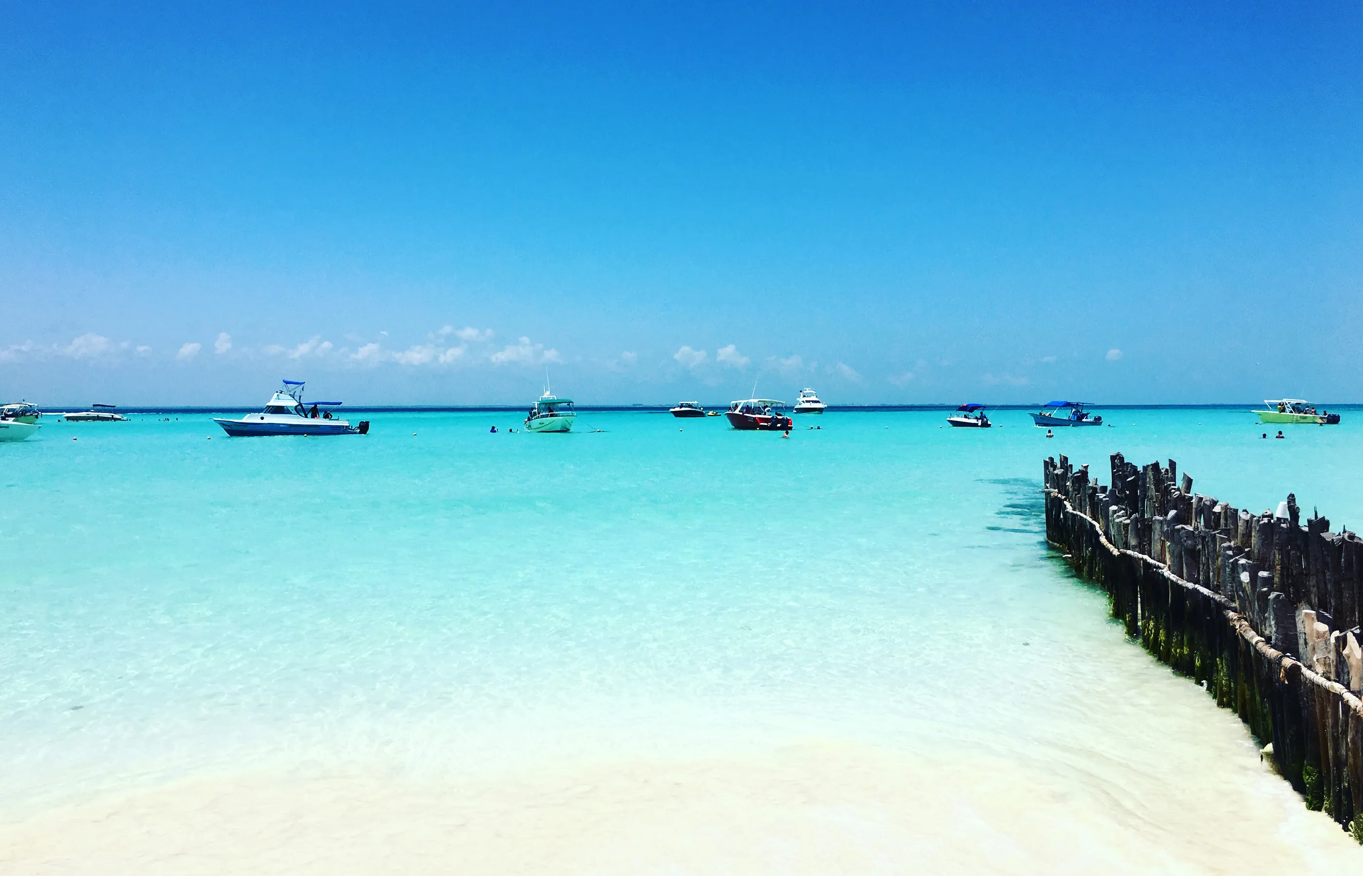 Turquoise Caribbean water and white sand beach at Isla Mujeres, Mexico