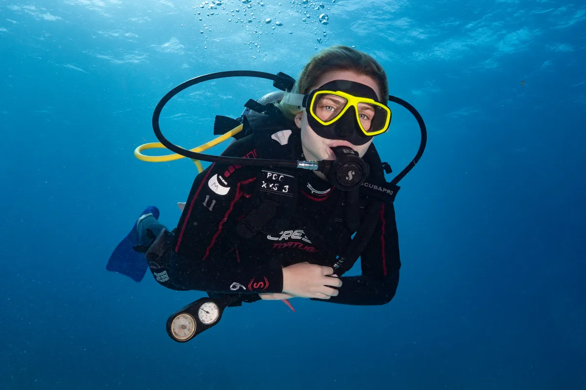Scuba diver exploring Caribbean reefs